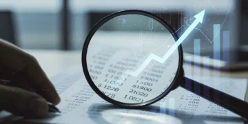 Magnifying glass examining Q4 2024 10-K report for hidden value